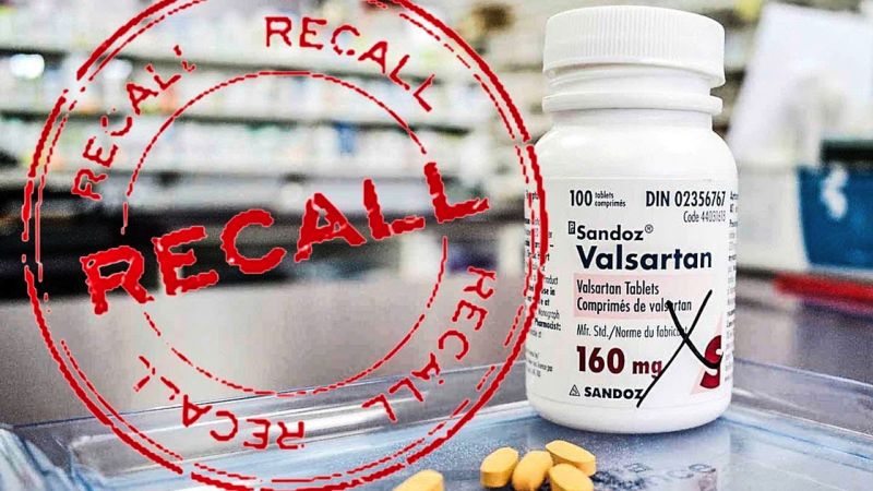 Valsartan medication recall alert, packaging and pills displayed with a prominent red recall stamp.