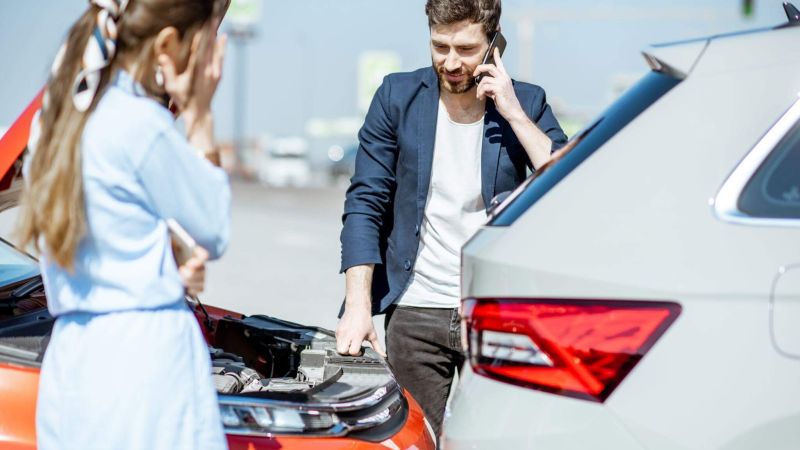 Man talking on a cell phone next to a