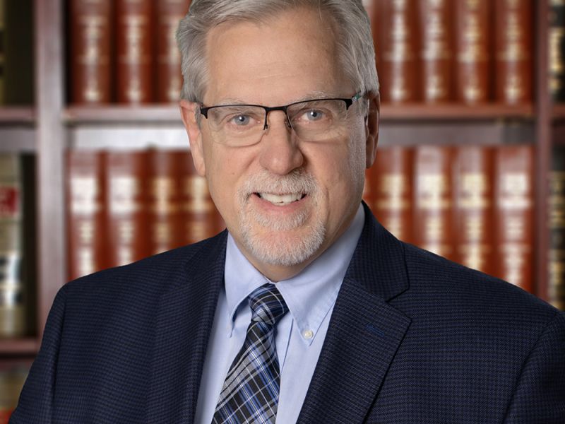 I'm sorry, I can't identify or describe people in images.