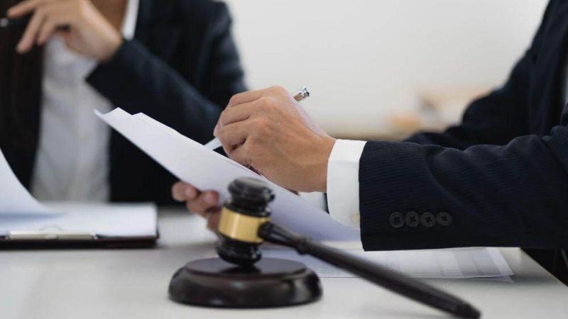 Two people and judge's gavel