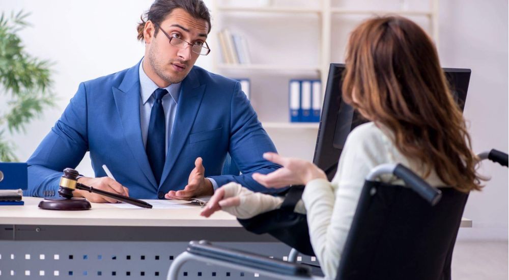 Man and woman discuss client review with Virginia slip