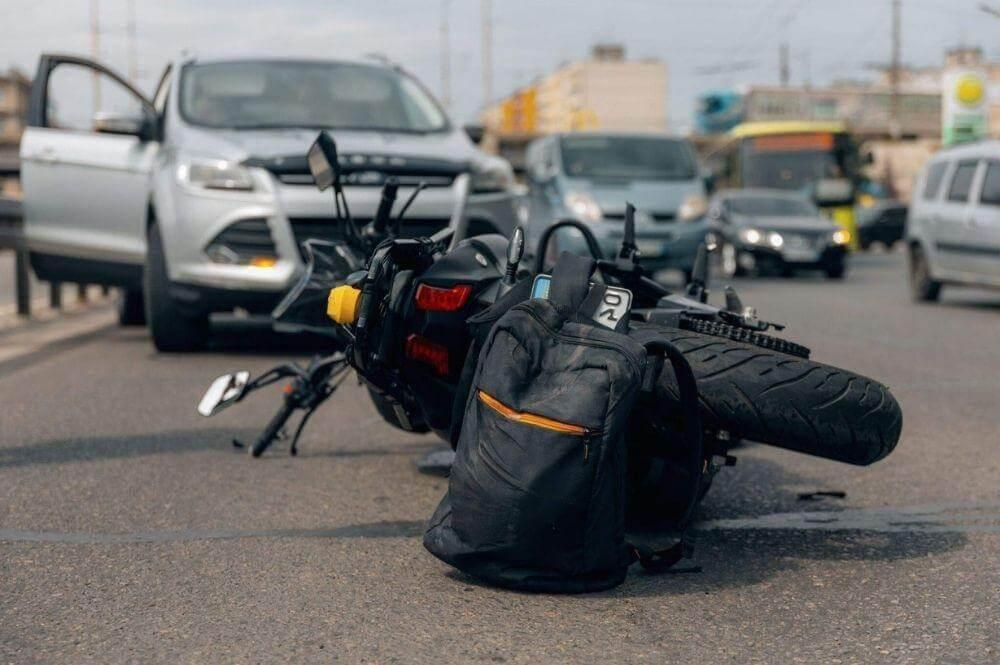 Motorcycle laying on its side after an accident