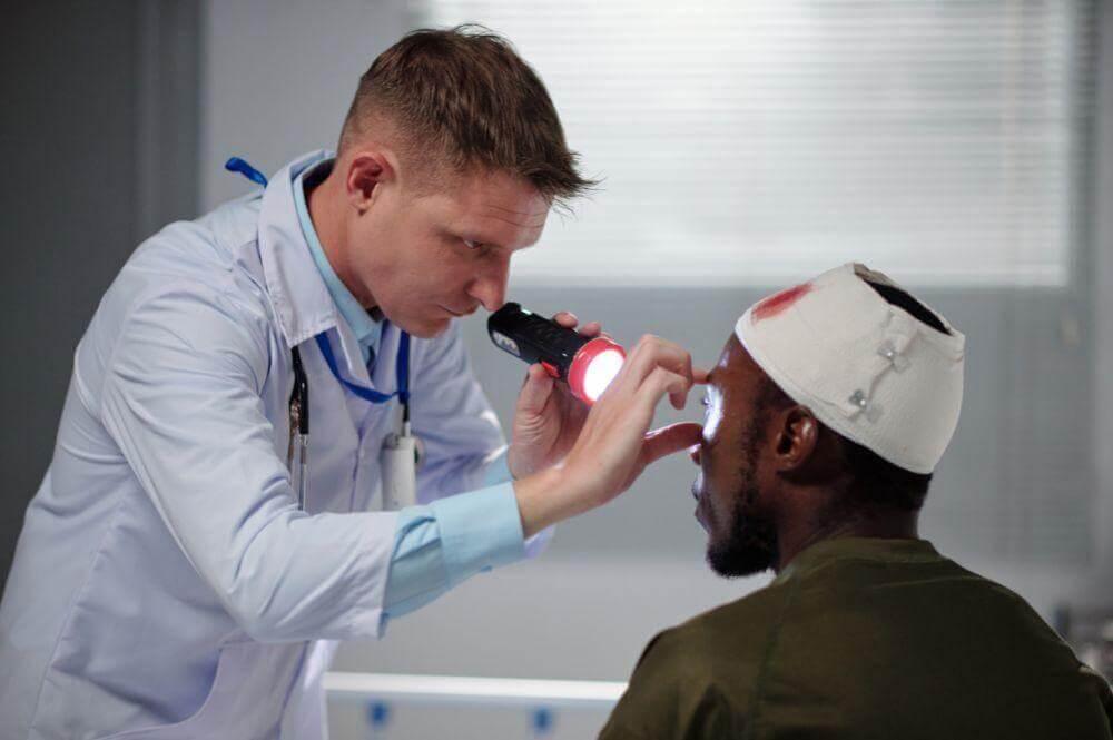 Doctor examining a patient